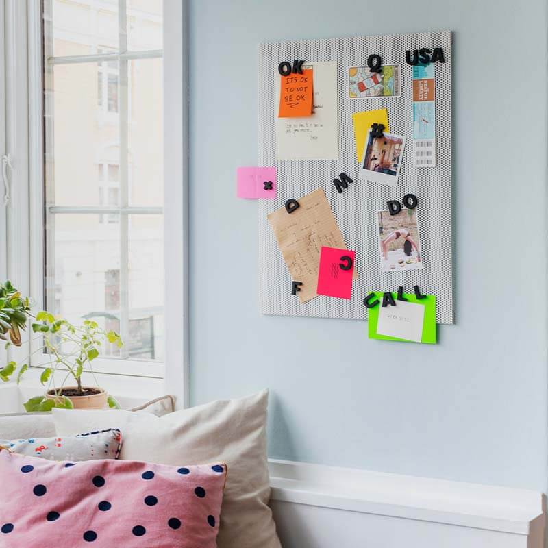 Anne Linde magnetic notice board featuring black Wordbits magnetic letters in the scandinavian home and apartment of Thus The Fuss